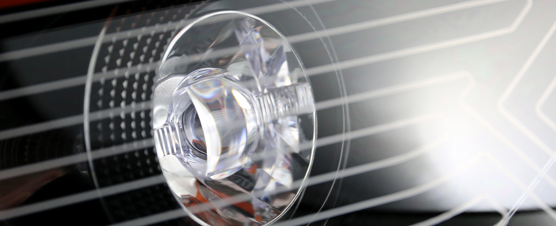 A modern close-up photo of a heavy duty LED Headlamp showing the lens